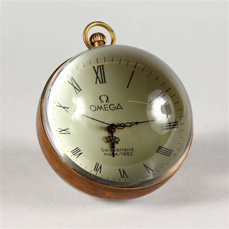 A Large Omega Style Glass Ball Watch With Open Face And Mov