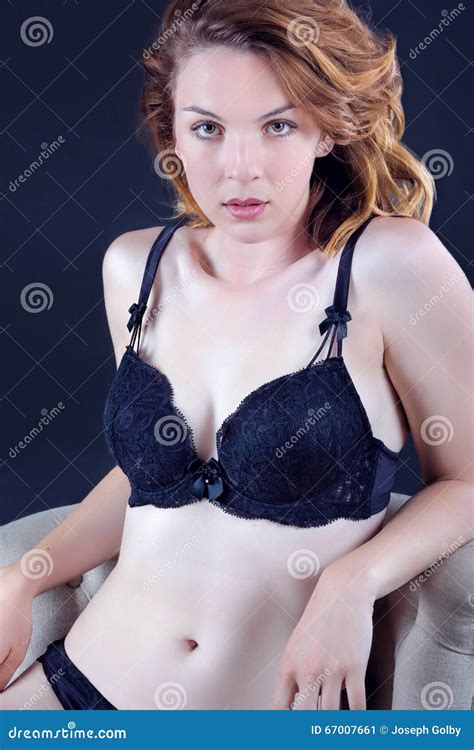 beautiful woman sitting wearing lingerie bra  panties stock image