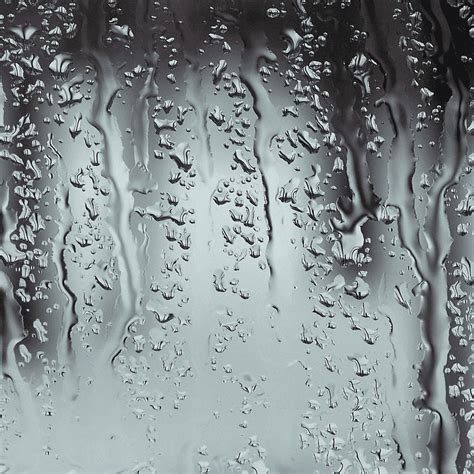 water drops on glass panel sash window rain drop glass rain texture