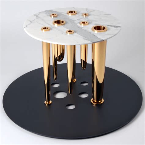 richard yasmine s glory holes tables has brass dildos for legs