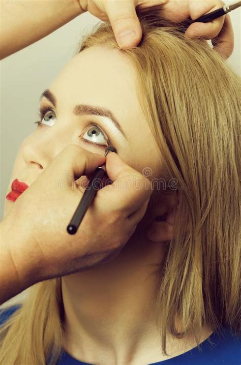 woman  powder  face  makeup brush stock photo image