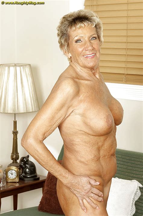 busty granny sandra ann stripping off her lingerie and poses naked