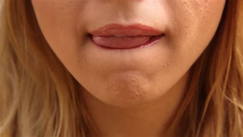 woman s tongue seductively licking lips close up stockvideoklipp 1856515 shutterstock