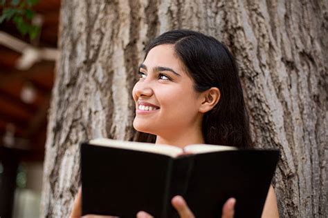 Hispanic Woman Reading Bible