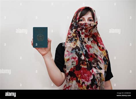 Young Arabian Muslim Woman In Hijab Clothes Hold Islamic Republic Of