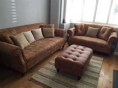 tan coloured leather sofas gotohomerepaircom grey walls living