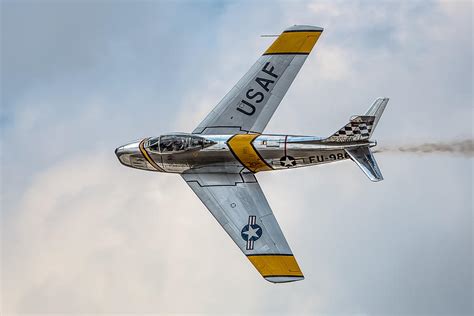 f86 sabre topside pass photograph by bill lindsay