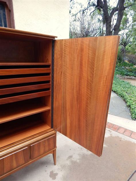 swedish mid century modern storage cabinet  book matched mahogany