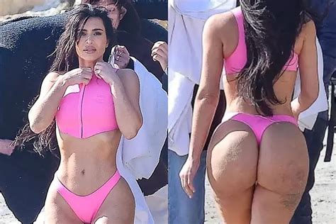 Kim Kardashian Flaunts Her Famous Curves In Very Cheeky Pink Thong Bikini