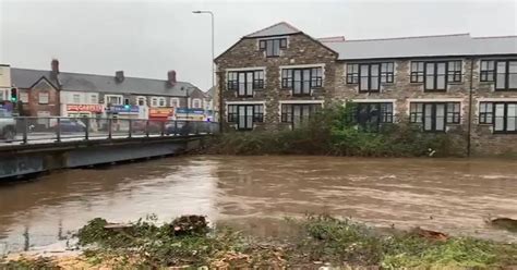 live updates as heavy rain leaves wales with flooded roads and multiple