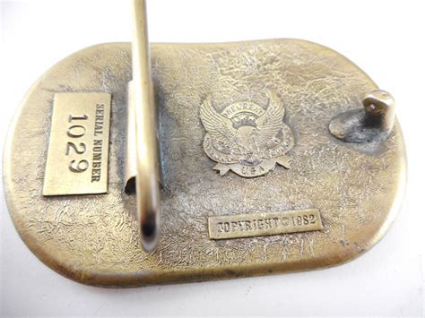 assorted brass type belt buckles switzers auction appraisal service
