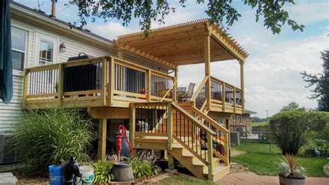 multi level wood deck  pergola  custom designed  built