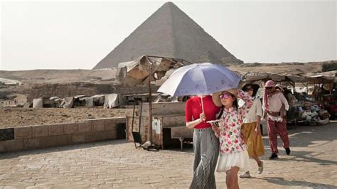 egypt arrests two over nude tourists on pyramid al arabiya english