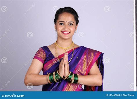 Beautiful Indian Woman Doing Traditional Gesture For Welcome And Thank