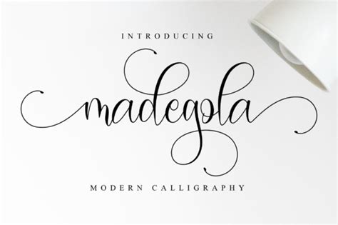 madegola script font  nissastudio creative fabrica