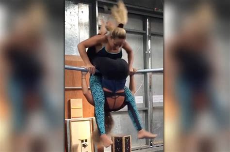 Two Stunning Gymnasts Go Face To Bum In Tandem Spin On