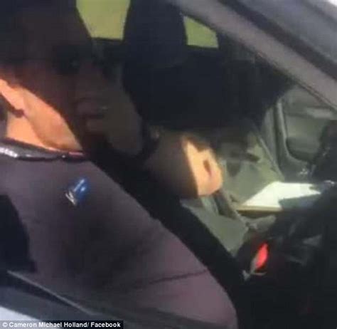 australian cop is caught sleeping on the job after he