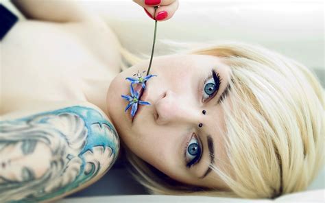 the girl with blue eyes and a beautiful tattoo wallpapers