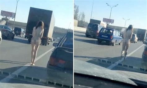 Russian Video Shows Naked Woman Walking Down Middle Of Moscow Motorway