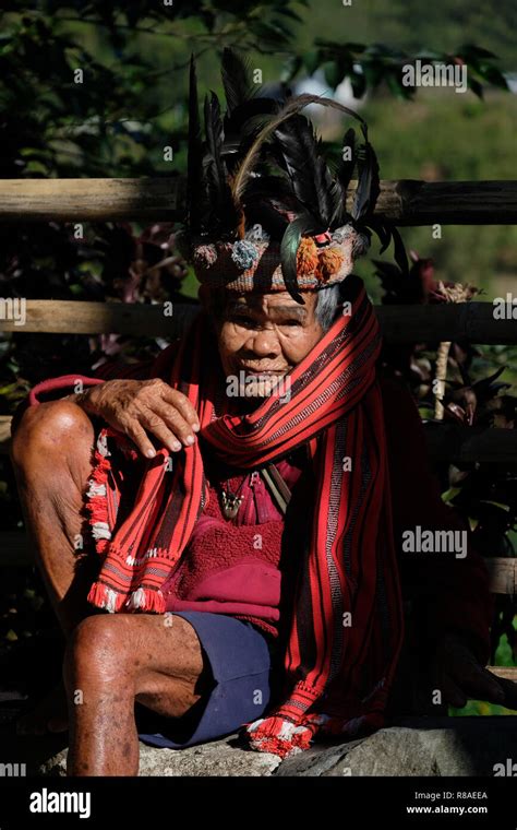 An Elderly Ifugao Man Wearing Headdress Adorned With Feathers At The