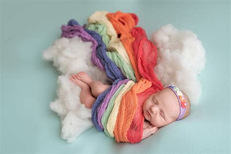 joyful rainbow baby  inspiring smiles  newborn sessions
