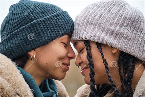 Dominican Lesbian Couple Smiling Showing Affection And Love At Street
