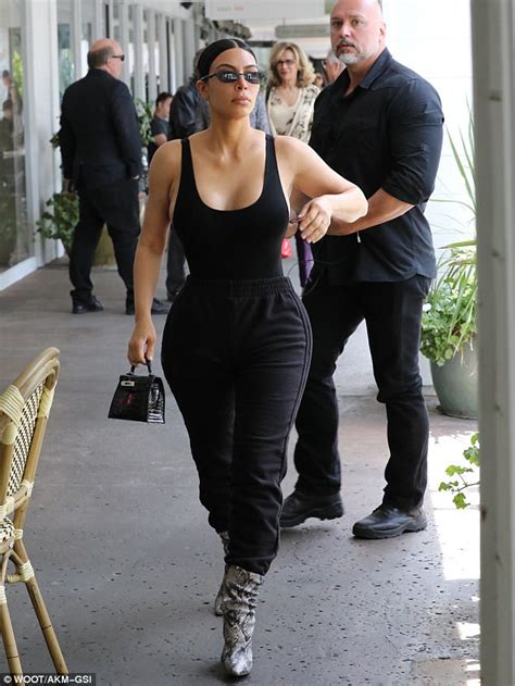 kim kardashian wears busty bodysuit for lunch outing daily mail online