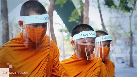 Monks Wear Face Masks On Alms Rounds