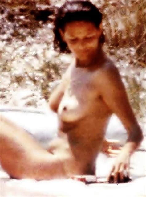 claudia cardinale shows nude boobs and sexy body on the beach