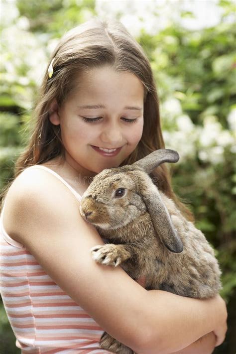 girl  bunny rabbit stock image image  enjoyment