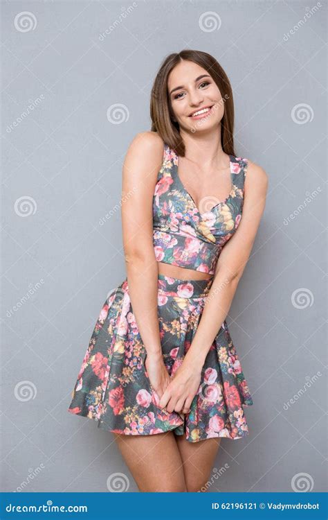 Portrait Of Young Shy Pretty Girl In Summer Floral Suit Stock Image