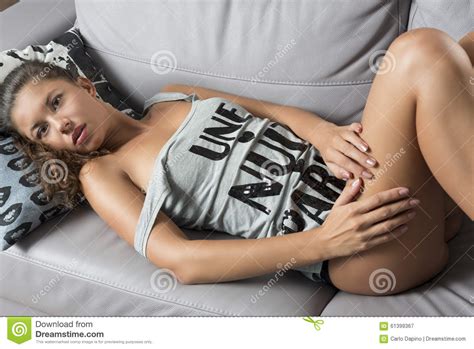 girl lying on sofa stock image image of natural brunette 61399367