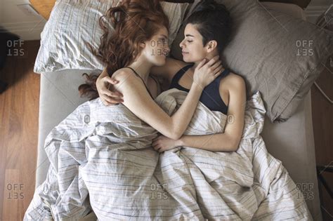 High Angle View Of Romantic Lesbian Couple Looking At Each