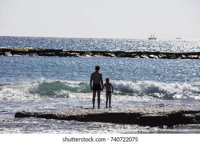 father doter watching sea family  stock photo  shutterstock