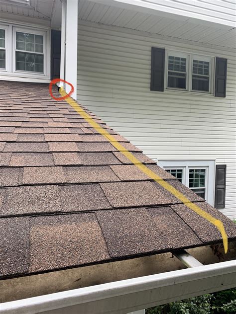 i want to extend the downspout from the upper roof into the lower roof