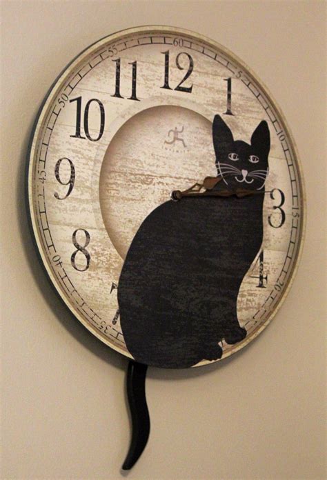cat clock klok horloges