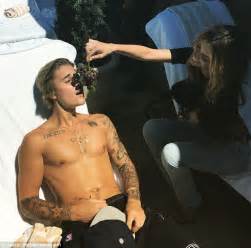 Justin Bieber Takes It Easy As Attractive Female Pal Feeds