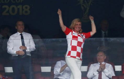 soaked but smiling croatian president wins admirers at