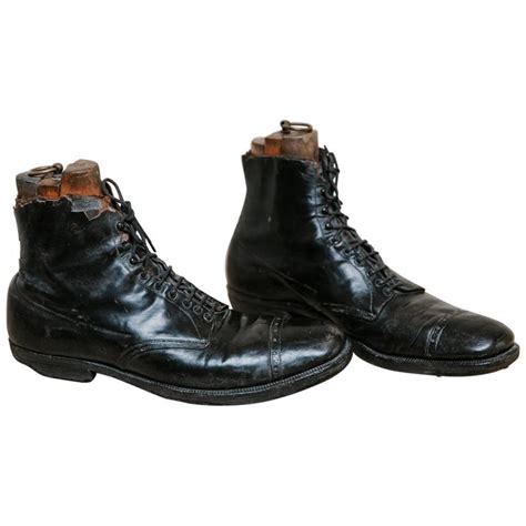 early  century pair  black leather giant shoes  stdibs