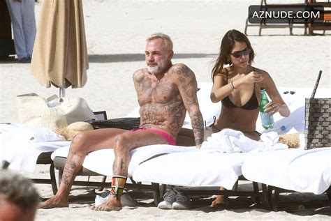 gianluca vacchi is exuding serious sex appeal while out in white trunks