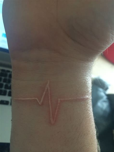 white heartbeat wrist tattoo with images wrist tattoos