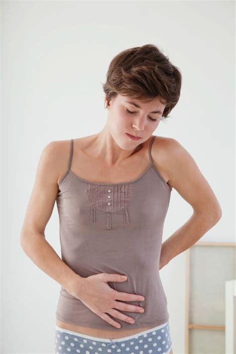 Lower Abdominal Pain Symptoms And Causes Explained By Experts