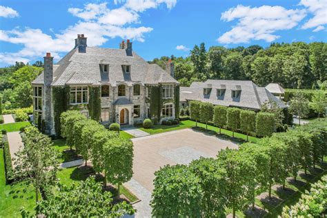 french style greenwich home  private lake access listed