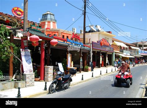 tourist restaurants  bars street promenade sidari corfu ionian islands greece stock