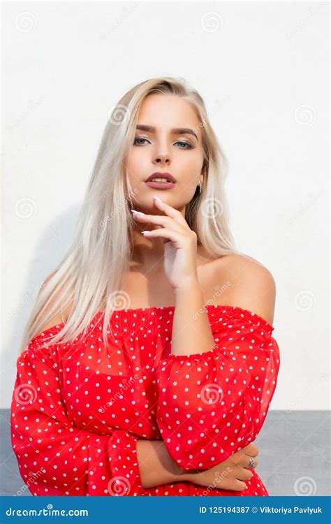 Fashionable Blonde Model With Naked Shoulders Posing On The In S Stock