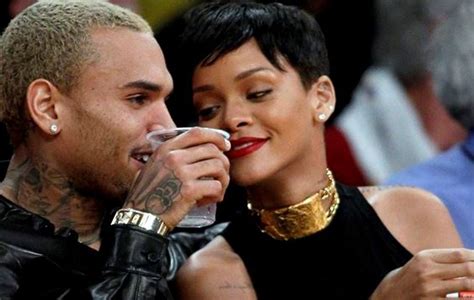rihanna fans furious after abusive ex chris brown comments on her risqu