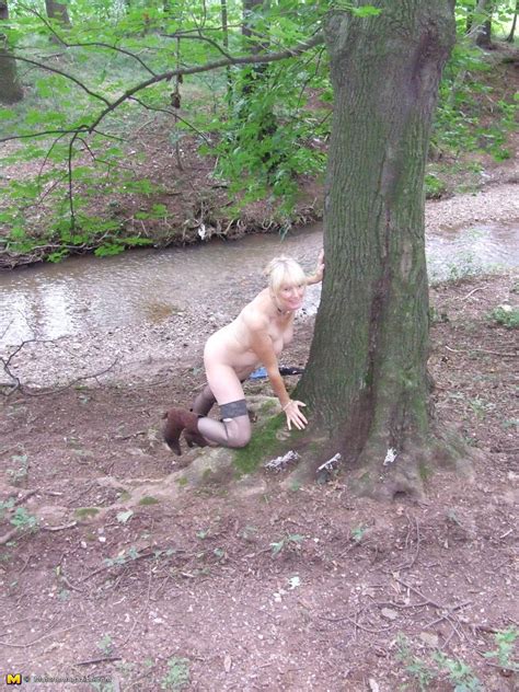 blonde mature slut playing naked in the forest pichunter