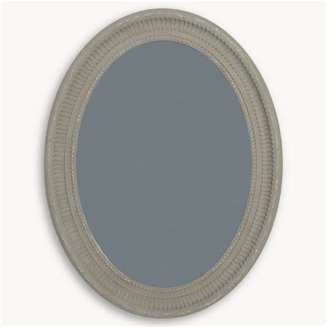 distressed grey oval mirror wbr interiors