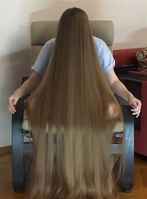 video blonde rapunzel hair covering in chair realrapunzels long