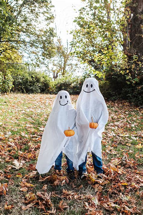 kids  ghost costume celebrating halloween  suprijono suharjoto